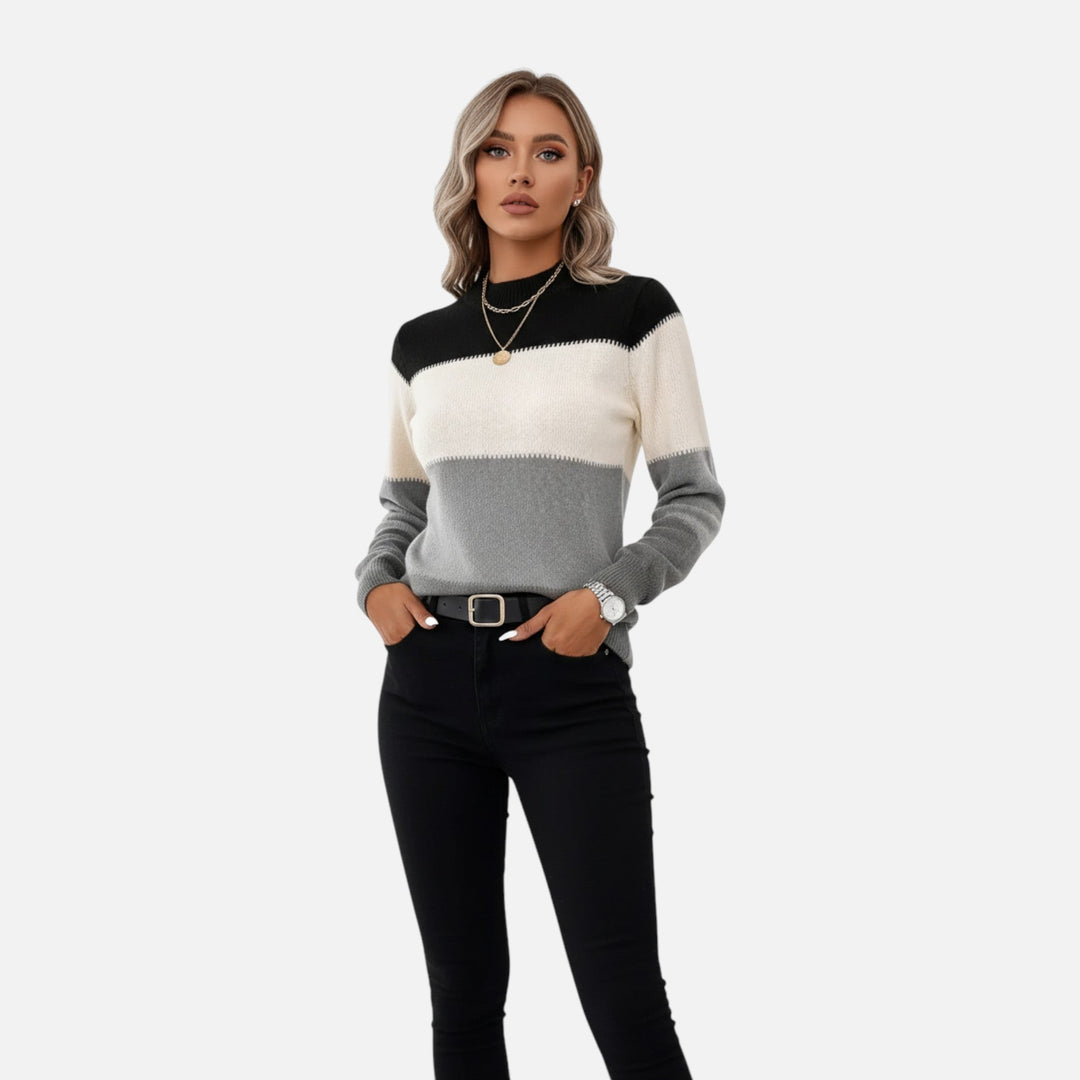 Lightweight women's knit crew neck sweater with classic stripes, offering all-season comfort and effortless style.