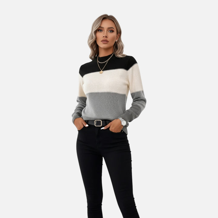 Lightweight women's knit crew neck sweater with classic stripes, offering all-season comfort and effortless style.