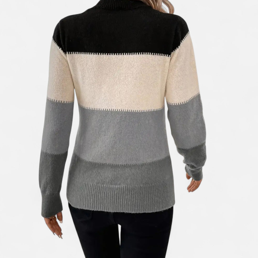 Classic striped women's crew neck sweater, a versatile knit pullover that offers both comfort and style.