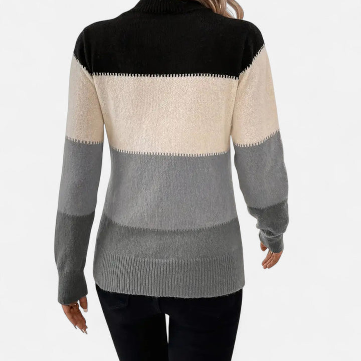 Classic striped women's crew neck sweater, a versatile knit pullover that offers both comfort and style.