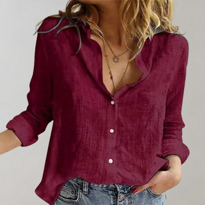Women's chic button-down blouse, a relaxed fit long sleeve top, excellent as a versatile layering piece.