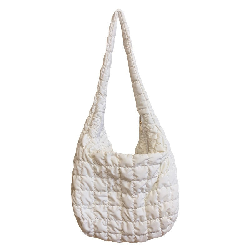 Soft down shoulder bag for women, a lightweight & casual handbag. Chic accessory, versatile for daily errands or trips.