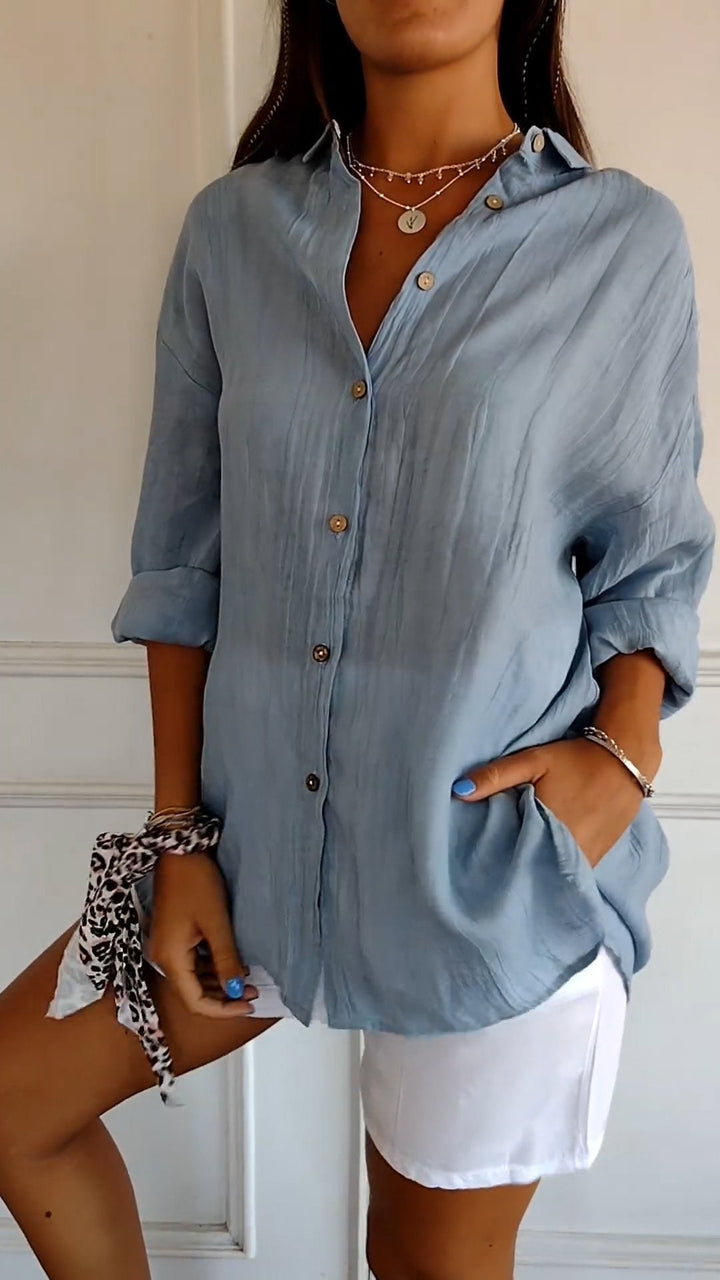 Professional yet casual women's button down shirt, a versatile long sleeve top for work or leisure.