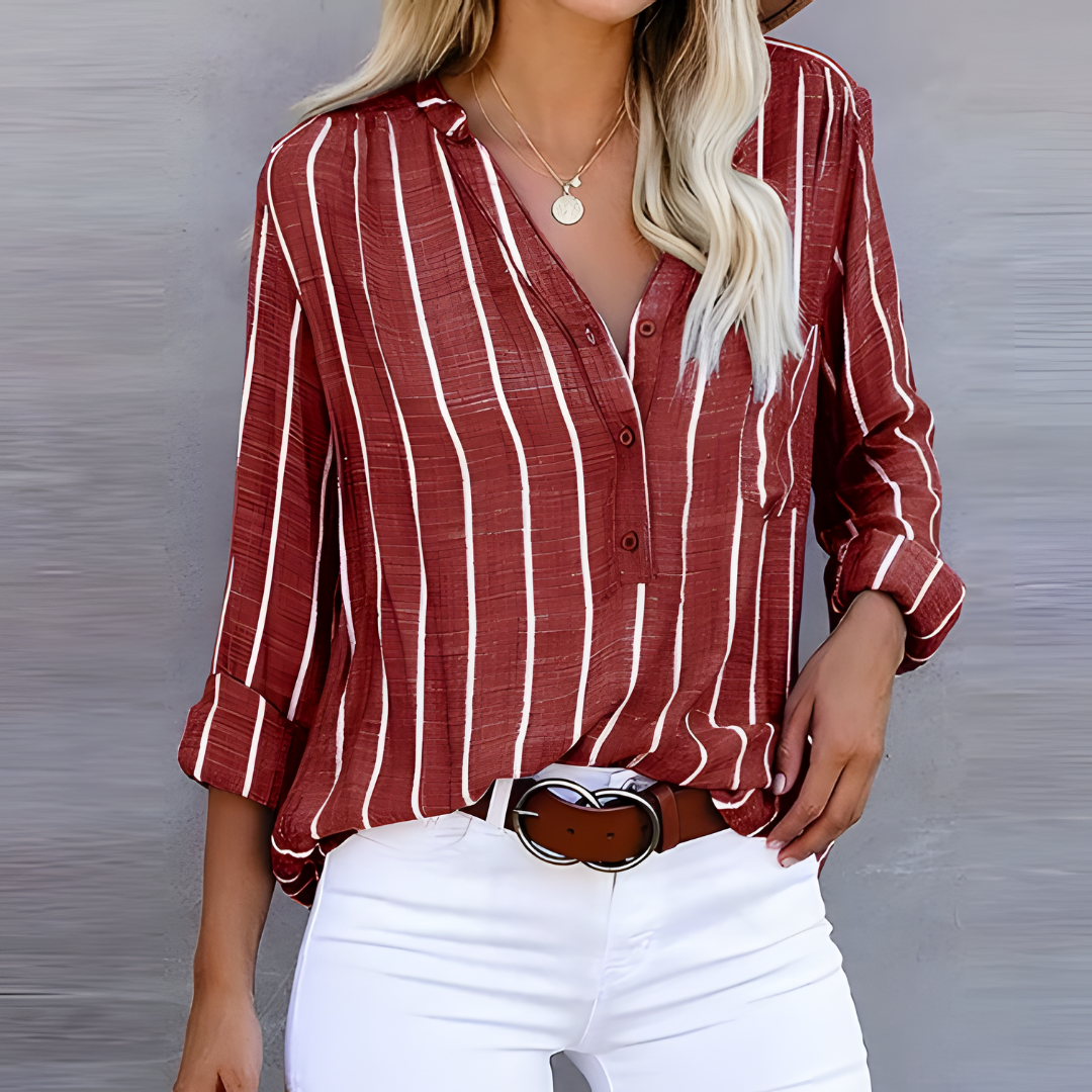 Elegant women's vertical stripe button-down blouse featuring stylish 3/4 sleeves, perfect for work.