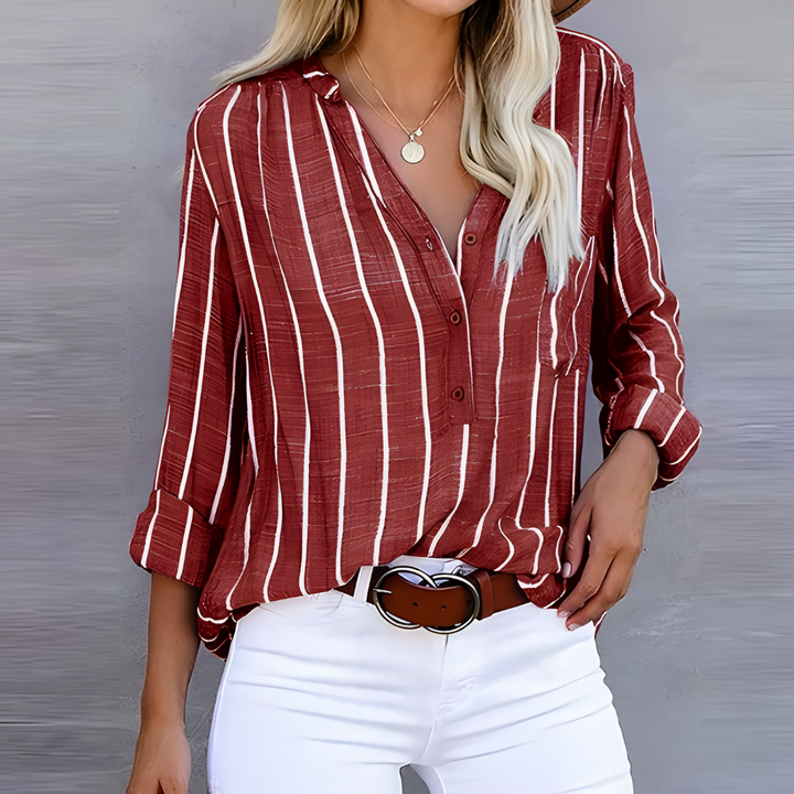 Elegant women's vertical stripe button-down blouse featuring stylish 3/4 sleeves, perfect for work.