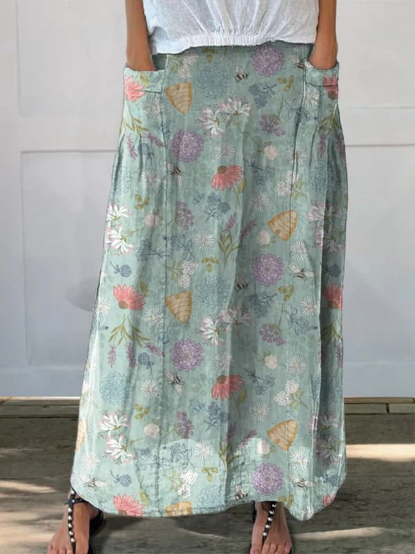 Women's vibrant A-line floral bumble bee midi skirt with pockets. Perfect for spring casual wear & comfort.