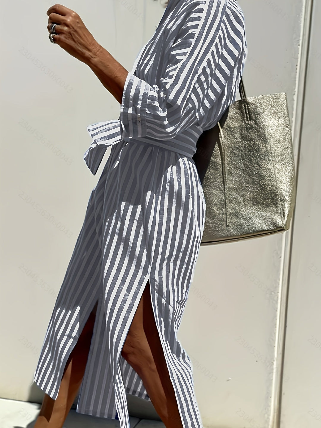 Chic yellow striped button-front belted dress for women, three-quarter sleeves, versatile style.
