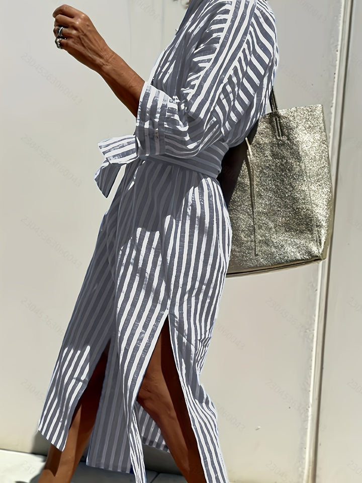 Chic yellow striped button-front belted dress for women, three-quarter sleeves, versatile style.