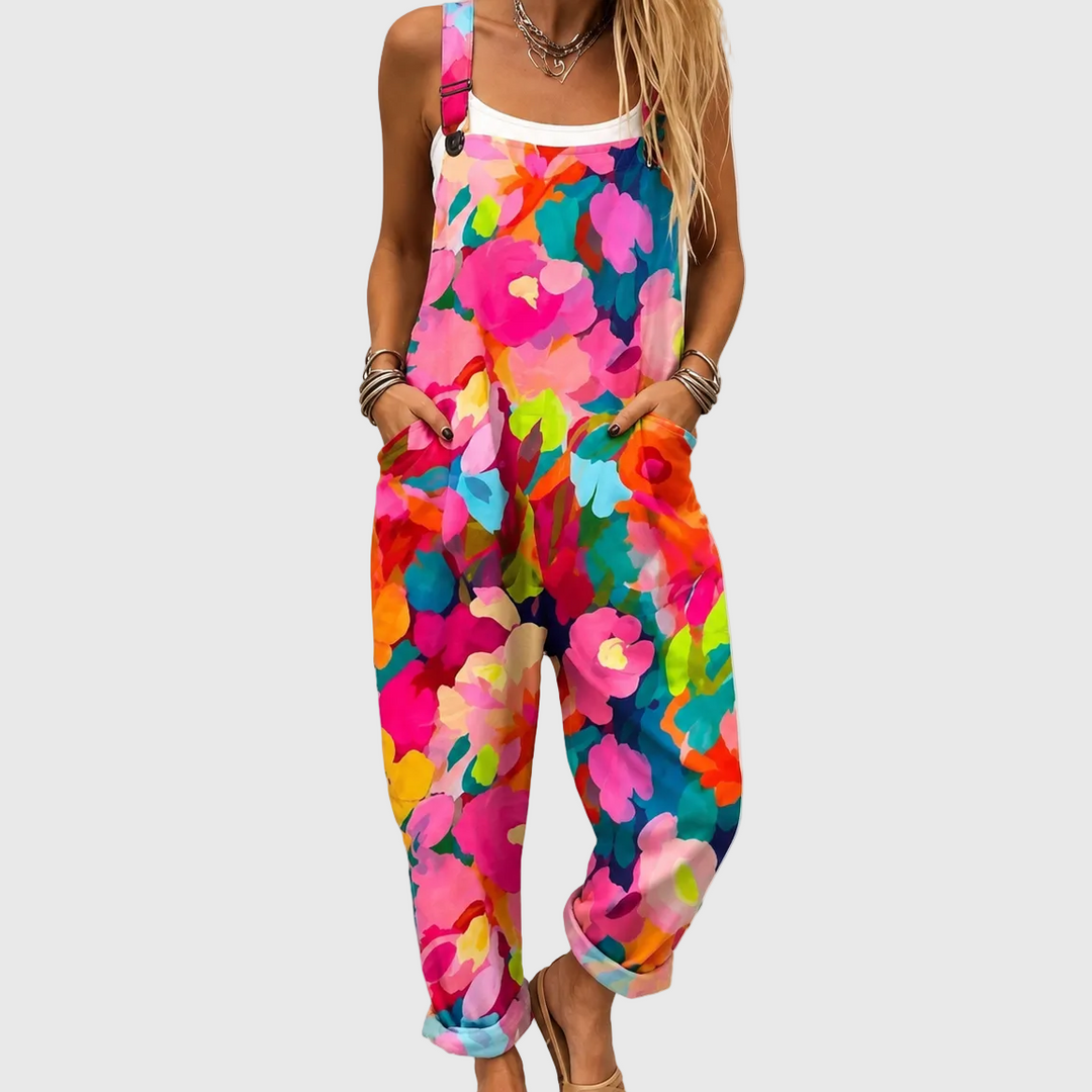 Women's vibrant floral print overalls, comfortable relaxed fit for summer casual wear.