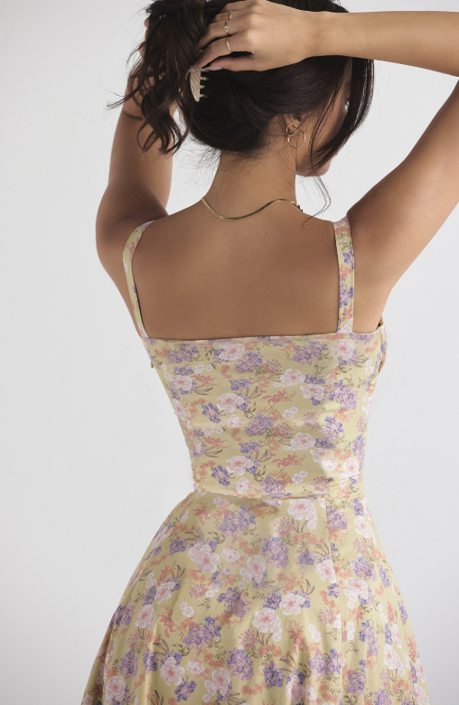 Women's casual floral midi dress with vibrant spring colors, comfortable and fashionable.