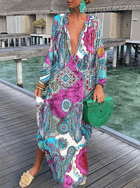 Comfortable women's vibrant printed summer dress. Sleeveless round neck casual sundress for effortless style.