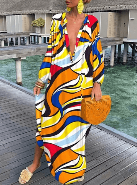 Stylish women's vibrant printed summer dress. Sleeveless round neck, a versatile casual sundress for her.