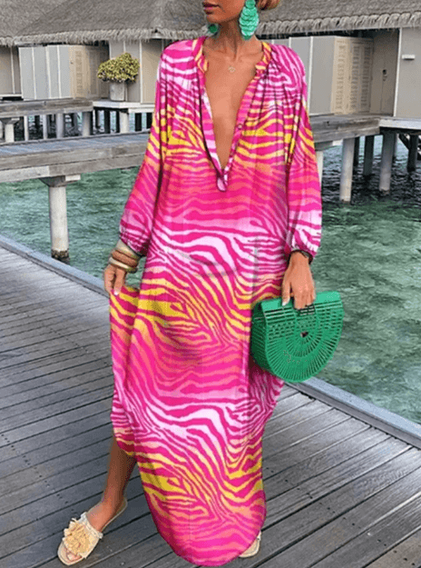 Fashionable women's vibrant printed summer dress. Casual sleeveless round neck sundress, perfect for warm weather.