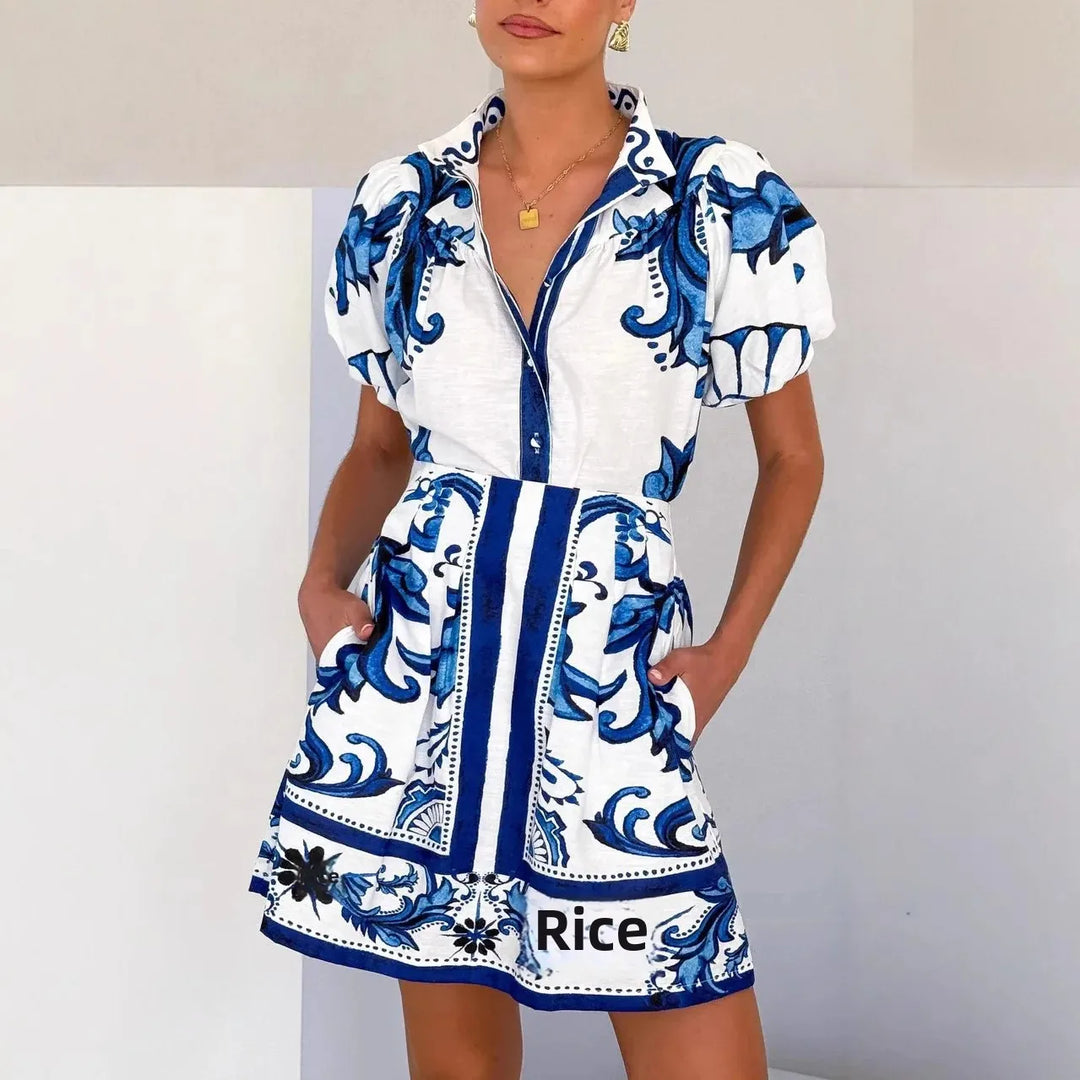 Women's vibrant floral puff sleeve mini sundress, perfect for summer days.