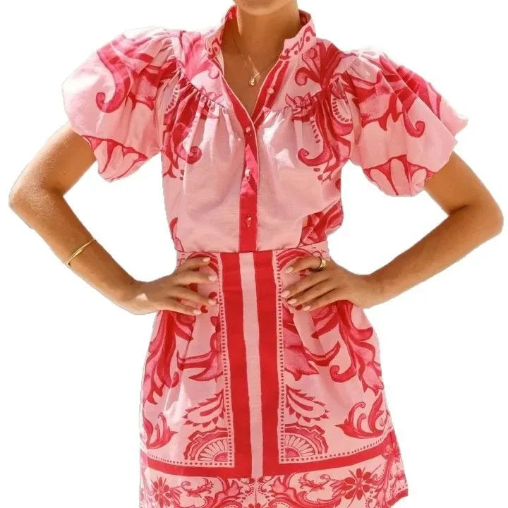 Women's summer floral mini dress with puff sleeves, vibrant and casual.