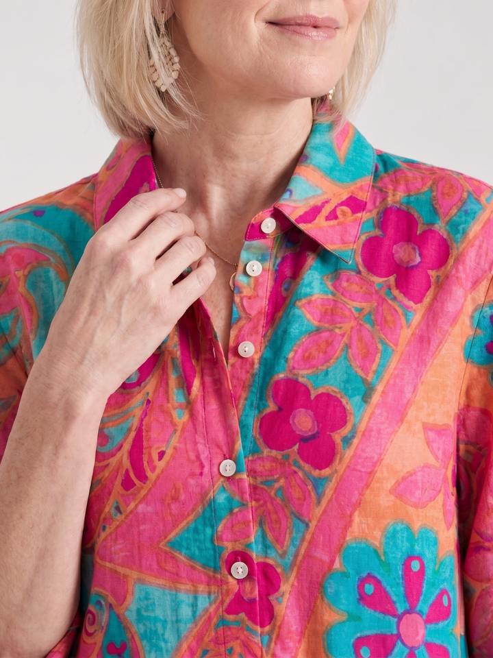 Versatile women's printed collared midi dress with button front, ideal for summer travel or relaxed casual wear.