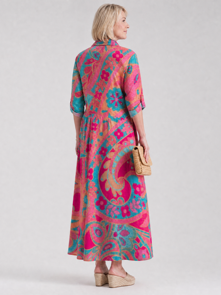 Relaxed fit women's printed summer midi dress, with three-quarter sleeves, collared neckline, and button front.