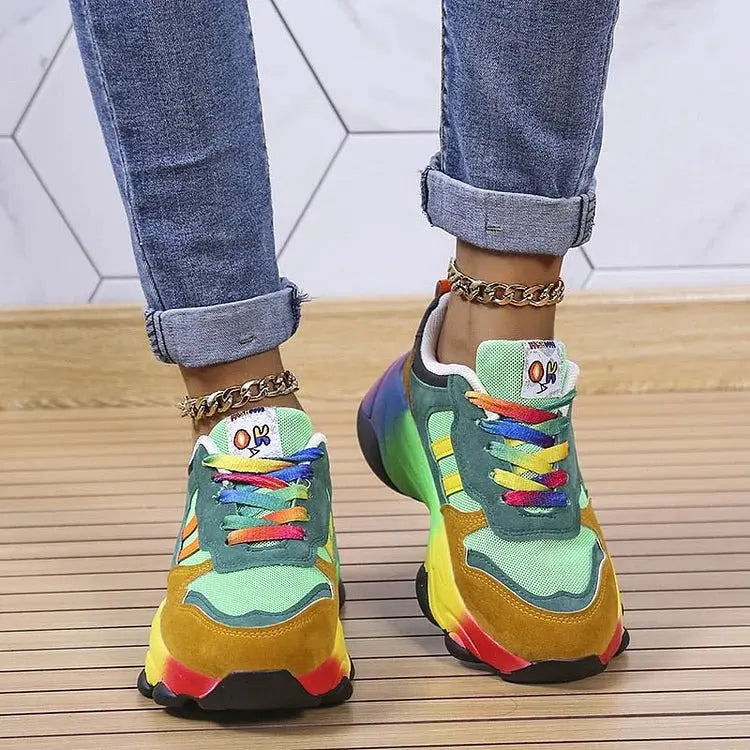 Comfortable women's rainbow platform sneakers. Chic lace-up design, chunky sole, ideal for fashionable casual looks.