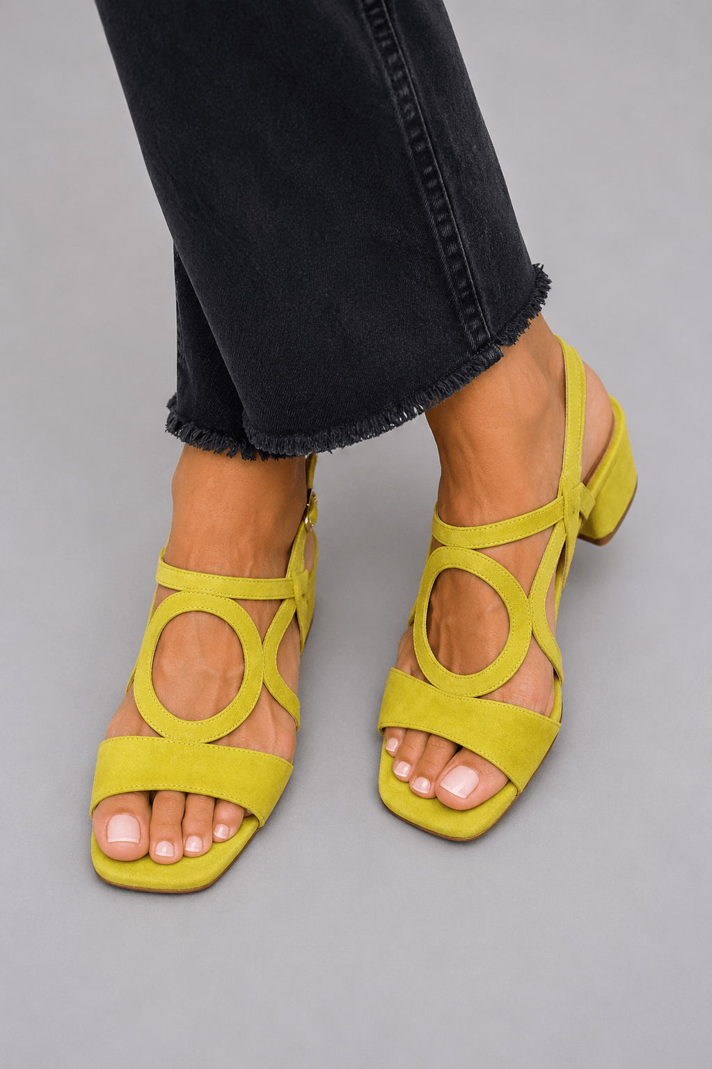 Fashionable women's vibrant heeled sandals, perfect for summer parties.