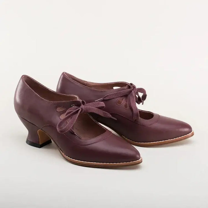 Fashionable vintage Mary Jane shoes with a stable block heel & signature strap, ideal for retro footwear lovers.