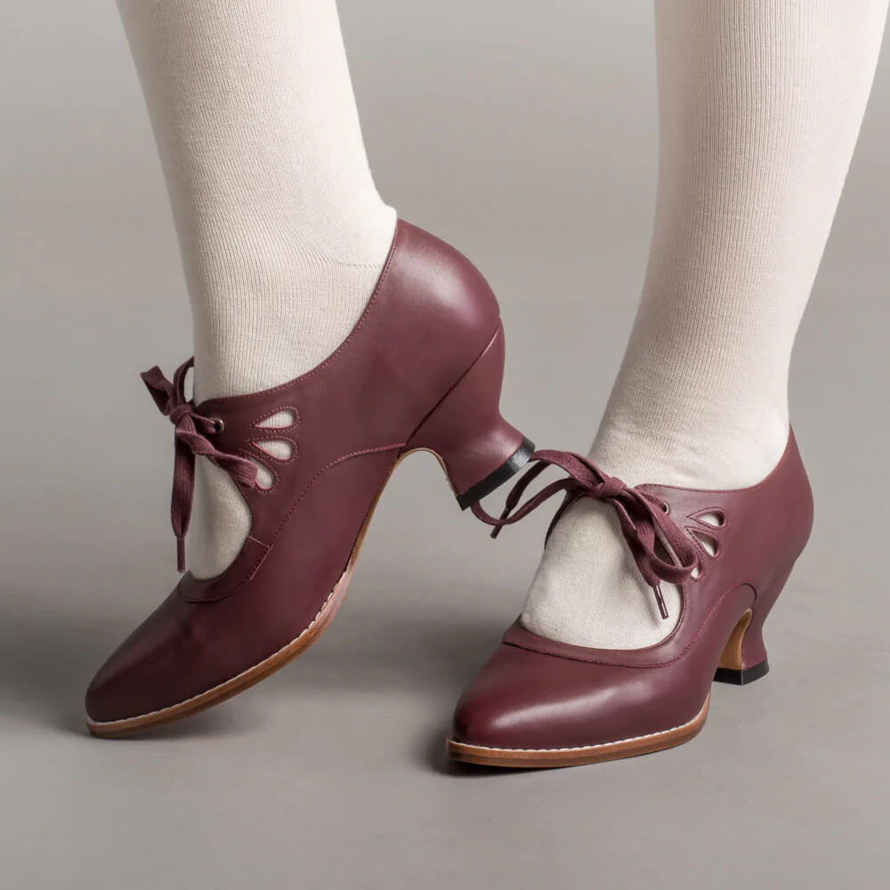 Pin-up style women's Mary Jane heels with adjustable strap & comfortable block heel for a retro look.