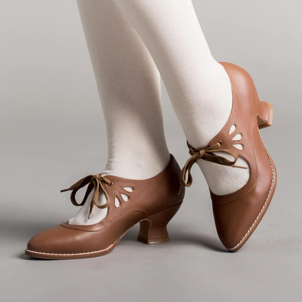 Stylish women's vintage Mary Jane block heels. Embrace timeless pin-up elegance with these comfortable shoes.