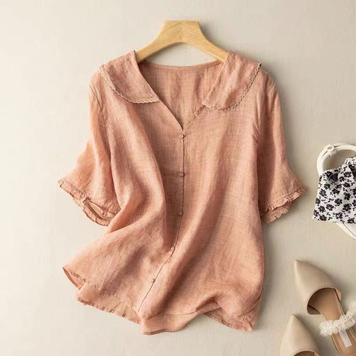 Relaxed fit women's vintage blouse, lightweight and versatile for everyday fashion or elegant casual styling.