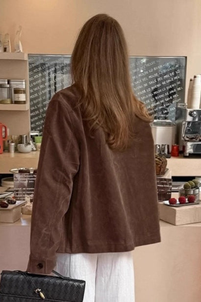 Elegant women's brown jacket featuring a vintage notched lapel collar & long sleeves, ideal for winter fashion.