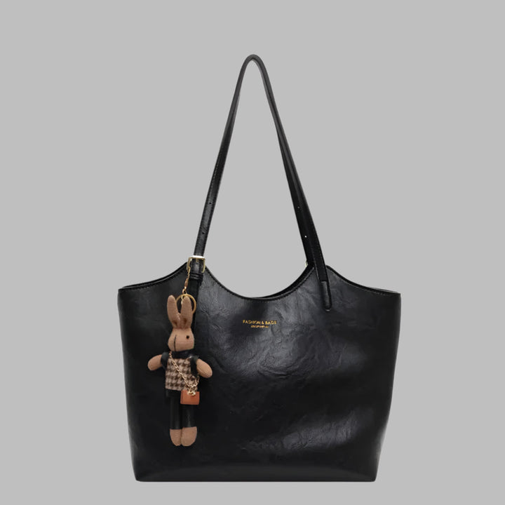 Premium vintage leather women's tote bag. Elegant shoulder bag and handbag, a timeless fashion accessory.