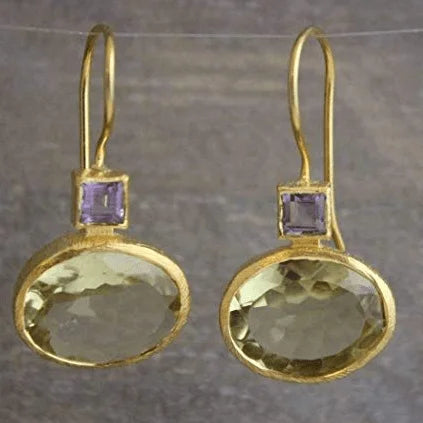 Women's vintage gold oval dangle earrings with vibrant green crystals & amethyst. Elegant statement jewelry.
