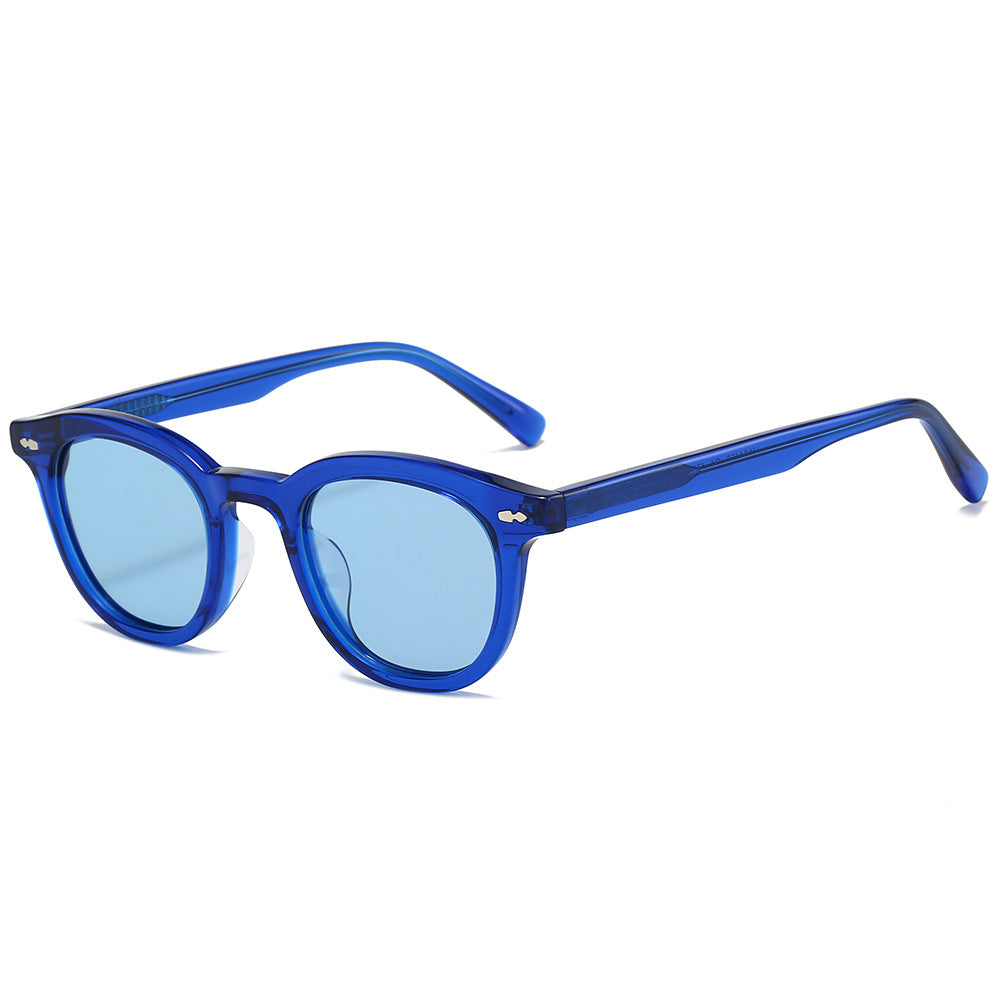 Gray vintage-style women's sunglasses offering UV eye protection. Fashionable plastic frame accessory.