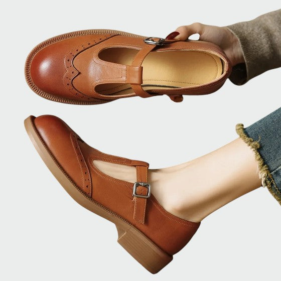 Apricot vintage Mary Jane shoes, perfect for a retro style look. Comfortable women's flats with strap detail.