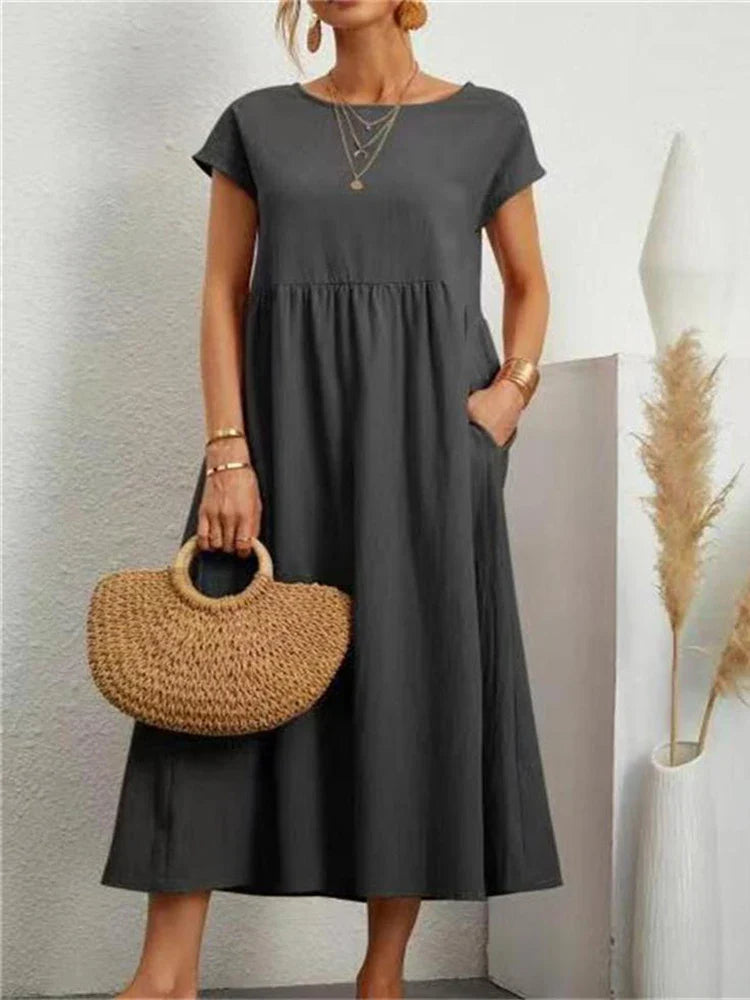 Beautiful vintage O-neck casual dress for women, a stylish option for summer and daily wear.