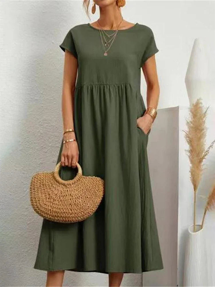 Feminine vintage O-neck summer dress, women's classic casual apparel for versatile everyday style.
