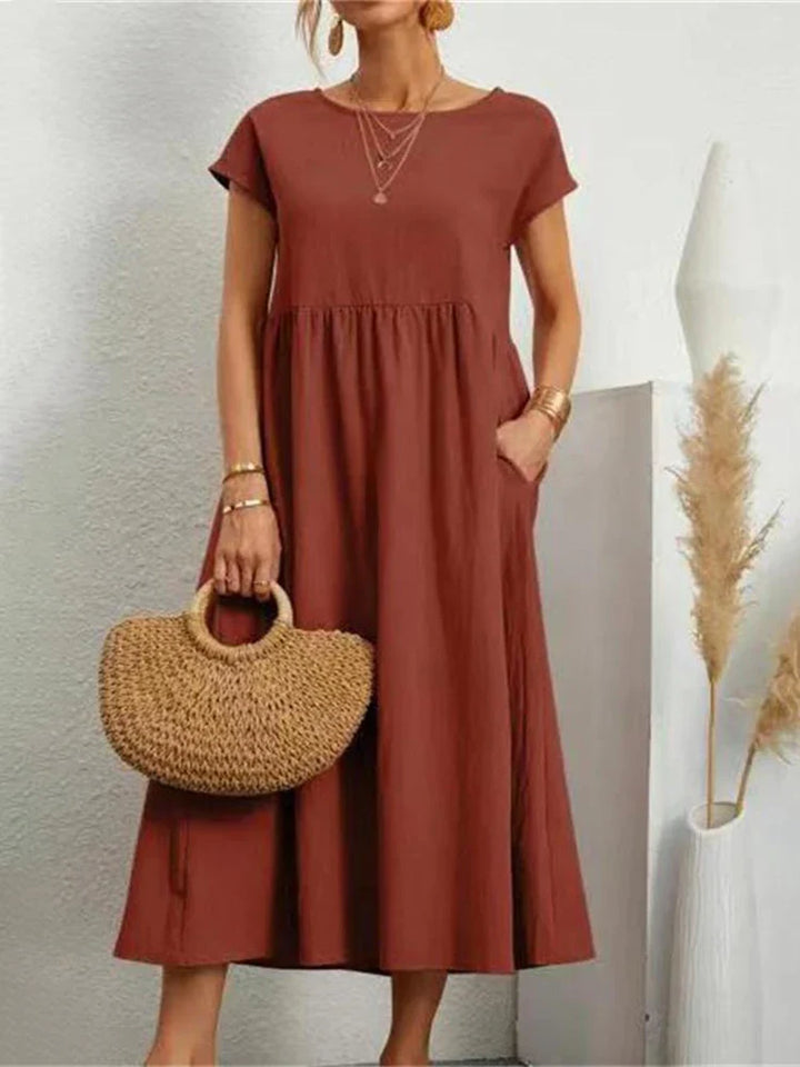 Classic O-neck casual dress for women, ideal for summer and versatile everyday style.