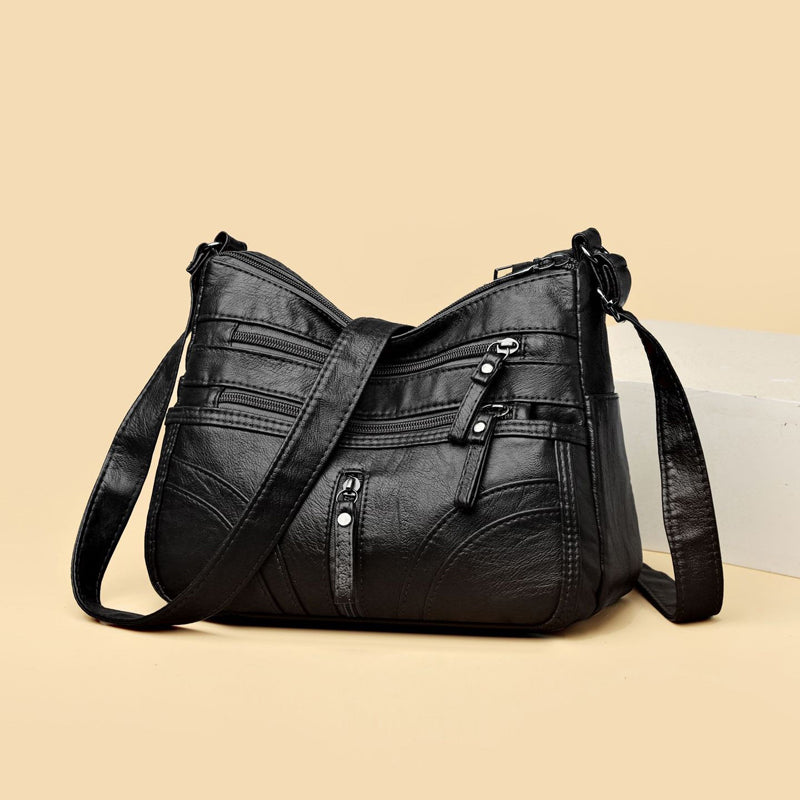 Carry your essentials in this women's relaxed vintage shoulder bag. Stylish everyday accessory.
