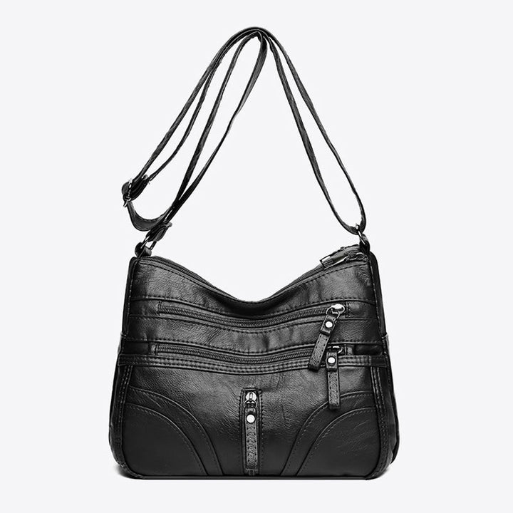 Soft women's vintage shoulder bag. Relaxed everyday style, a versatile fashion accessory.