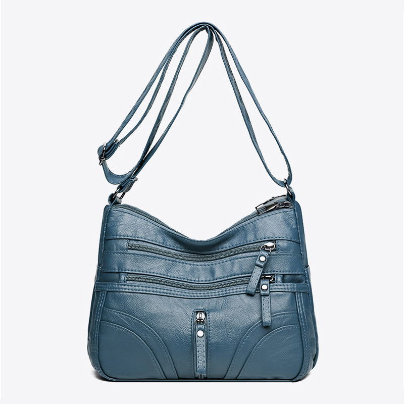 Stylish women's vintage everyday shoulder bag. Relaxed design, versatile handbag and fashion accessory.