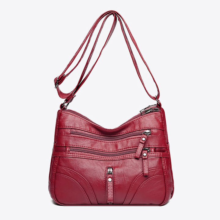 Classic women's vintage shoulder bag. Everyday fashion accessory with a relaxed, timeless look.