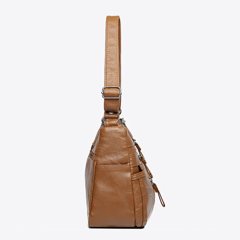 Women's relaxed shoulder bag. Vintage style everyday handbag, also functions as a crossbody bag.