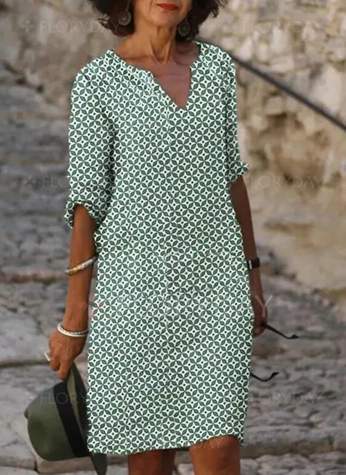 Women's vintage split-neck flowy midi summer dress, perfect for casual elegance & vacation style.