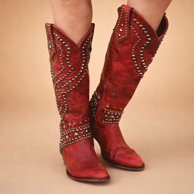 Stylish women's knee-high fashion boots with vintage studding and a comfortable chunky heel.