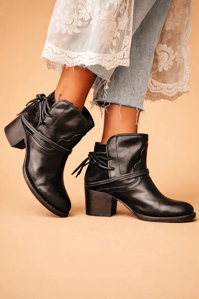 Elegant women's dress ankle boots in a vintage style with a bold thick heel and side zipper