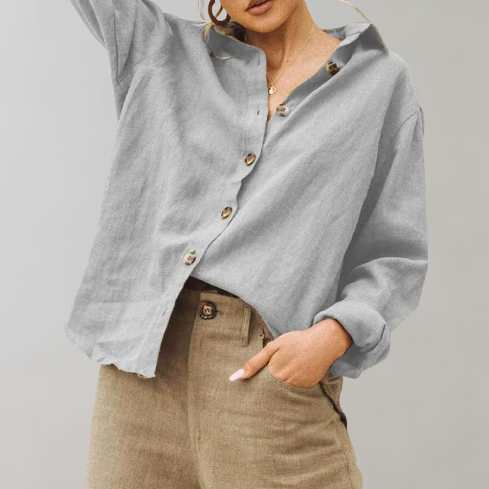 Elegant women's vintage inspired blouse with classic button-down front, perfect for workwear or casual fashion.