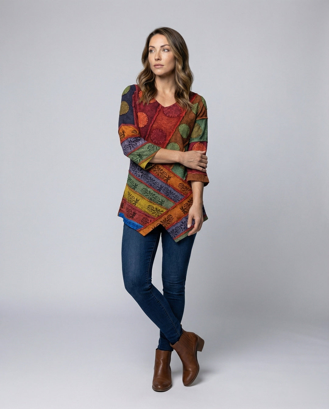 Women's vintage V-neck long sleeve top in classic black, offering effortless elegance.