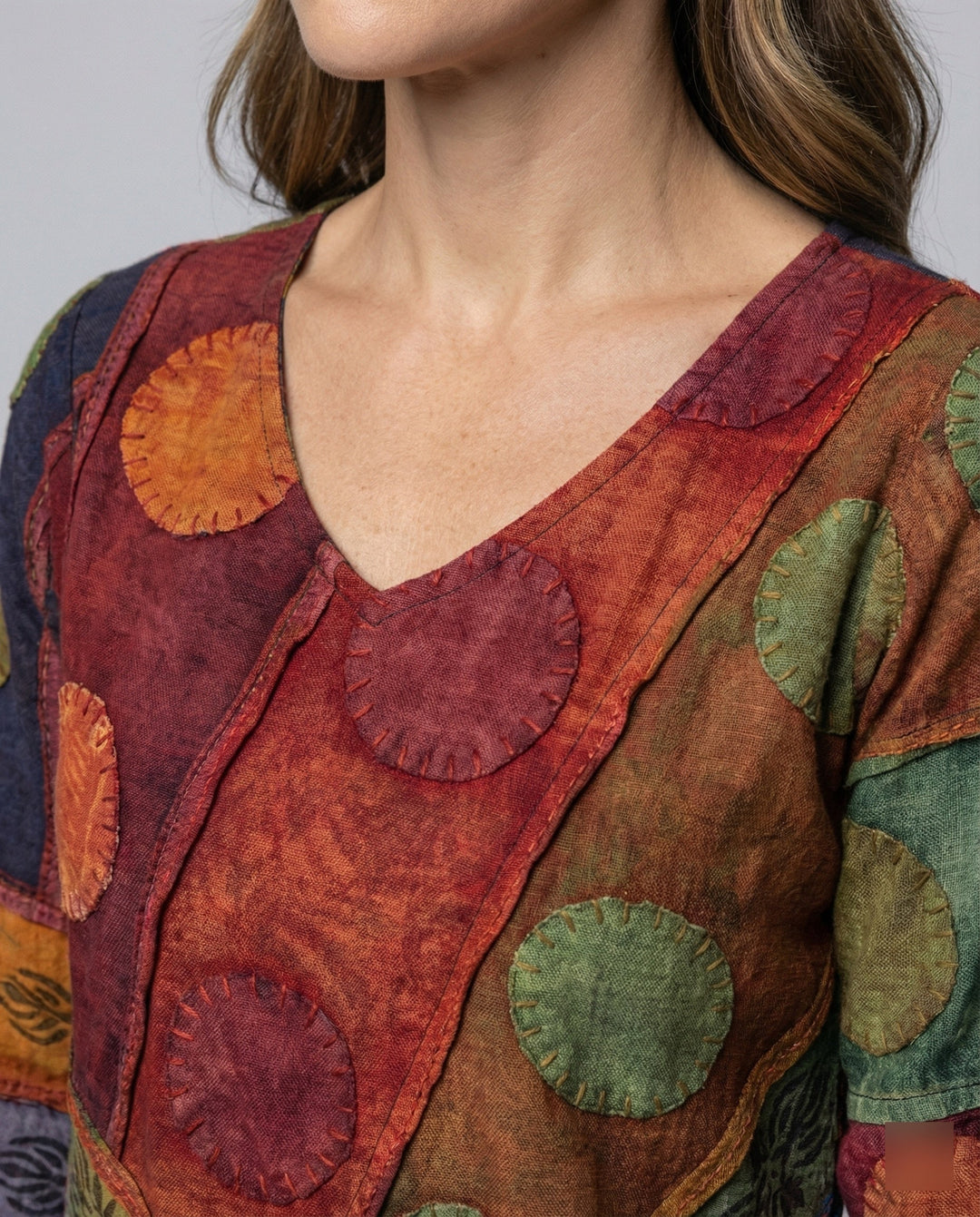Comfortable and fashionable women's top with a flattering V-neck and long sleeves.