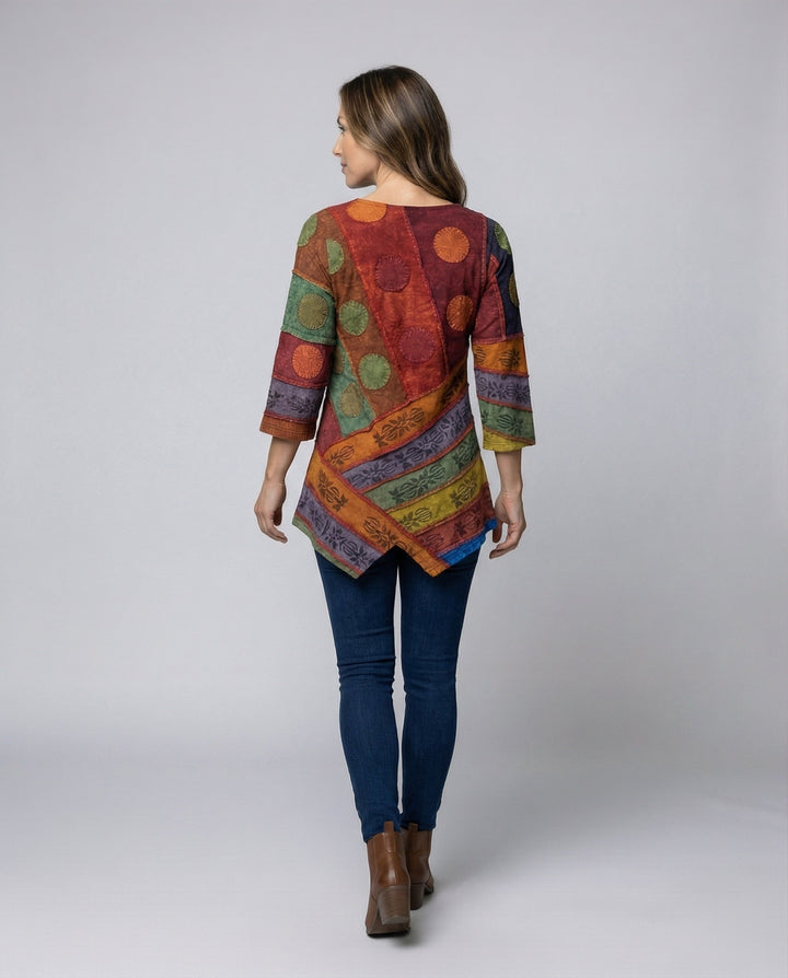 Elegant vintage-style top for women, featuring a timeless V-neck and long sleeves.