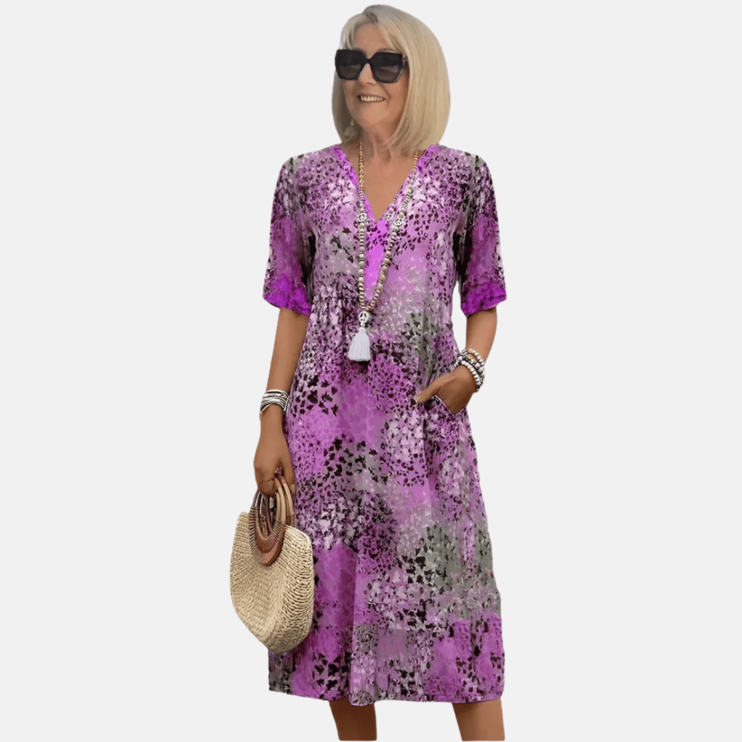 Stylish women's vintage print v-neck sundress. Loose fit, knee-length for comfortable spring and summer casual wear.