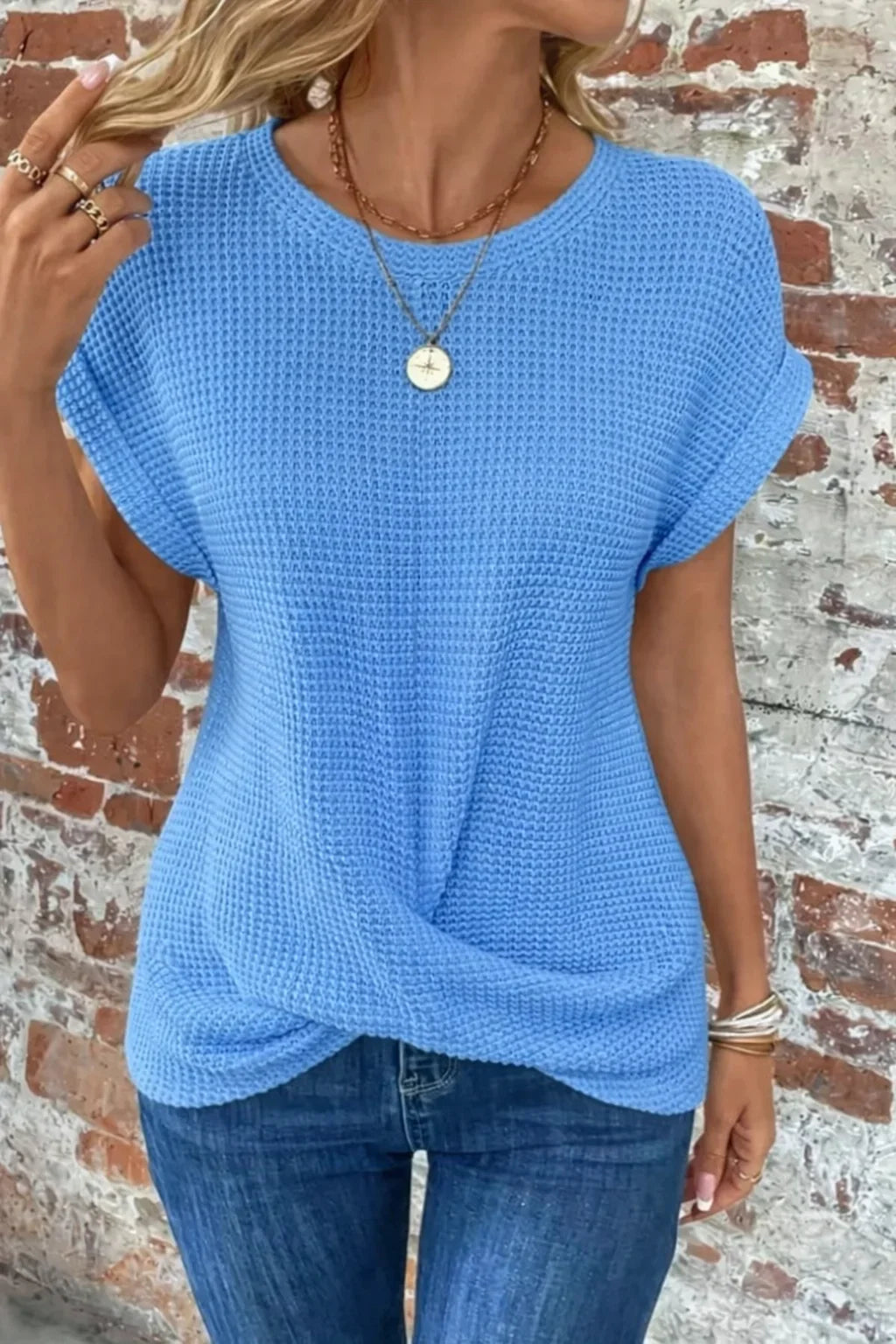 Modern women's waffle knit short sleeve top, casual, with an eye-catching front twist design.
