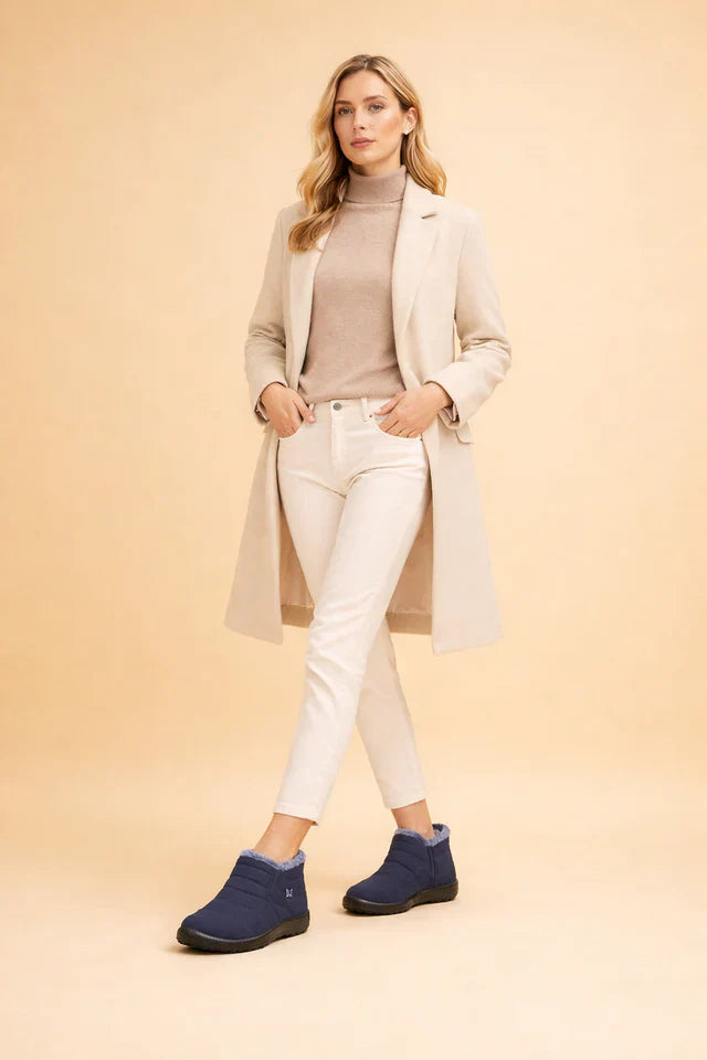 Reliable women's warm boots, providing secure footing in icy conditions.